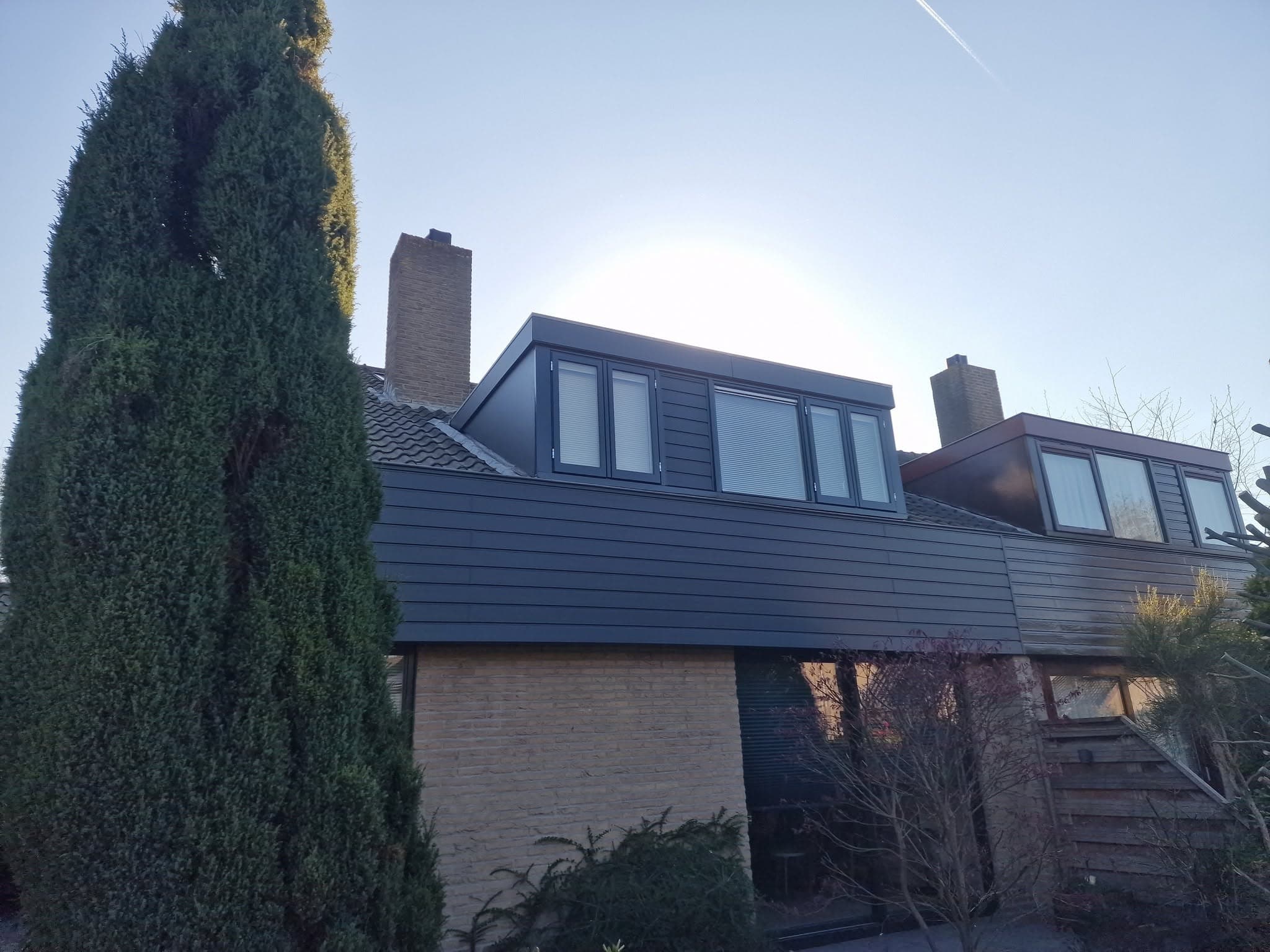 Woning met Keralit gevelbekleding en dakkapel, afgewerkt door Weeda Totaalonderhoud
